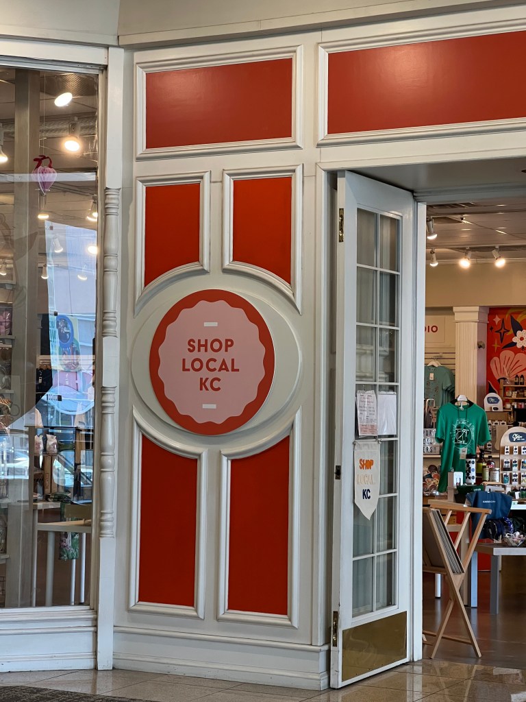 Orange exterior of Shop Local KC storefront.