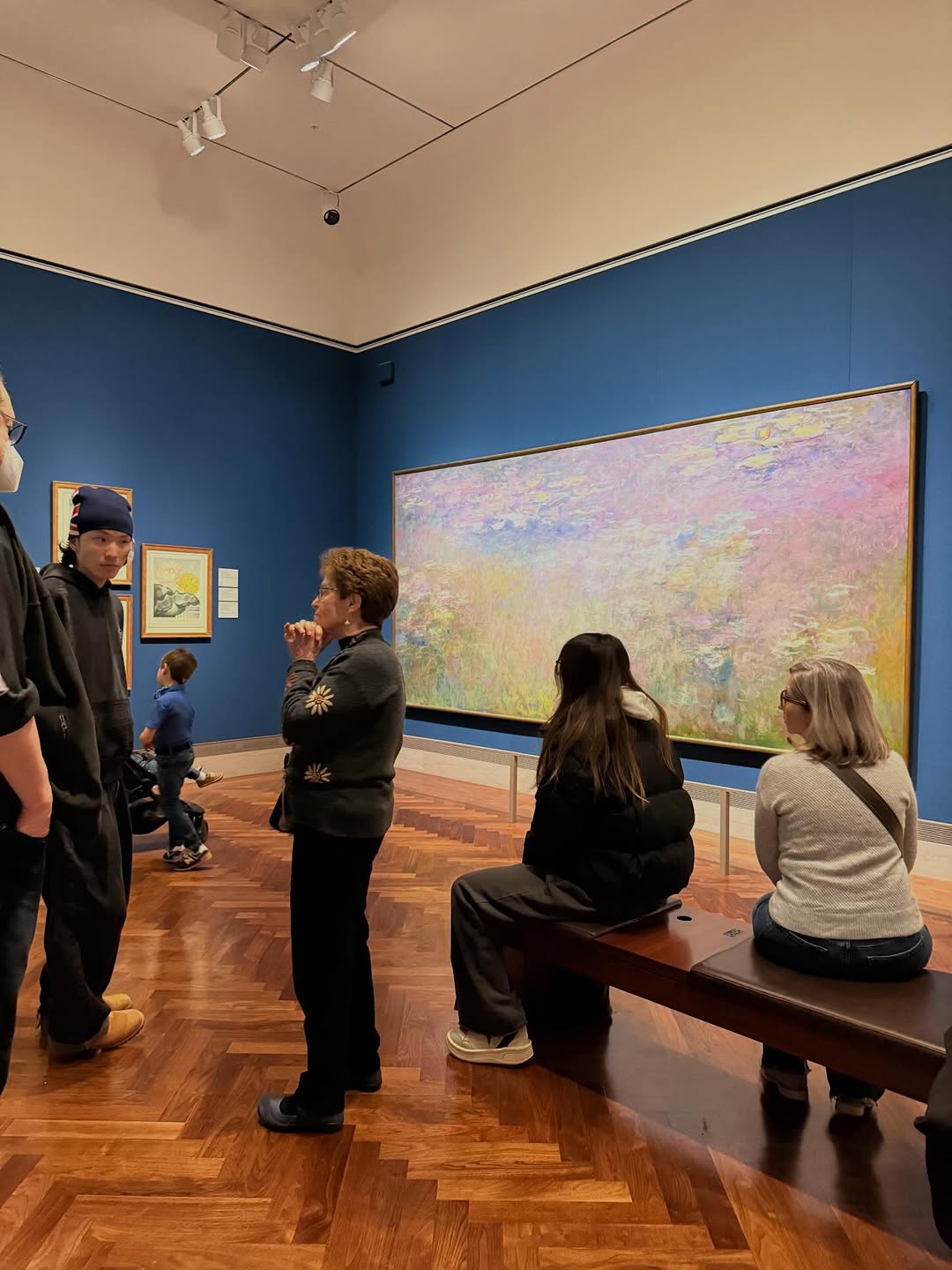 Students looking at art in museum