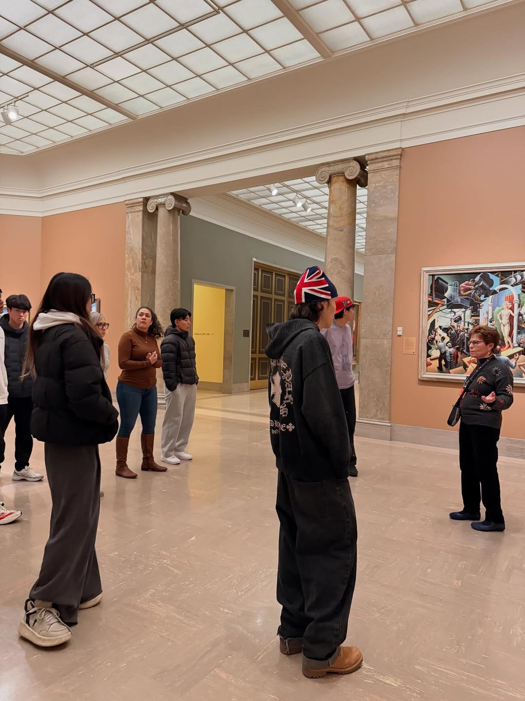 Students looking at art in museum
