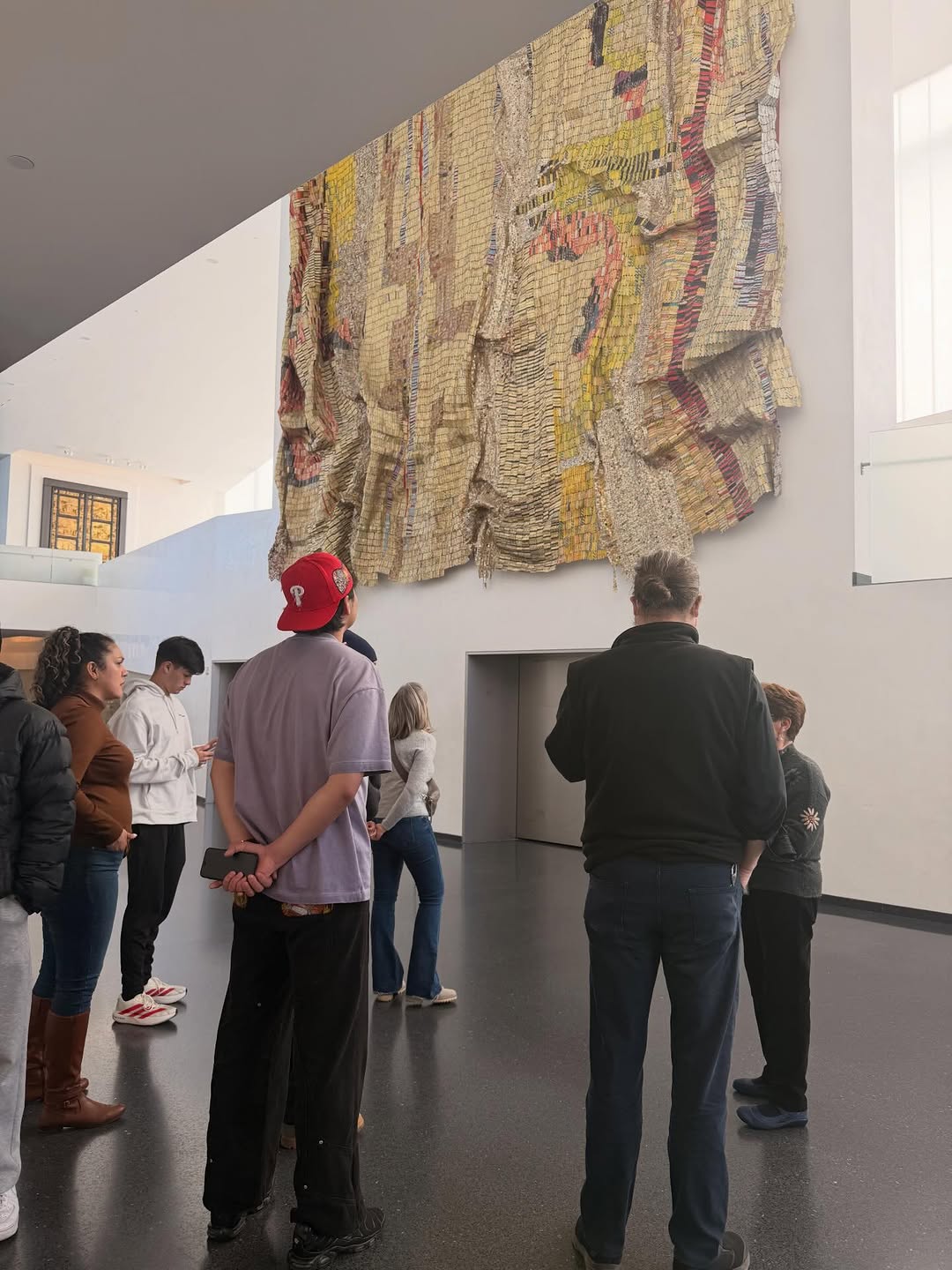 Students looking at art in museum