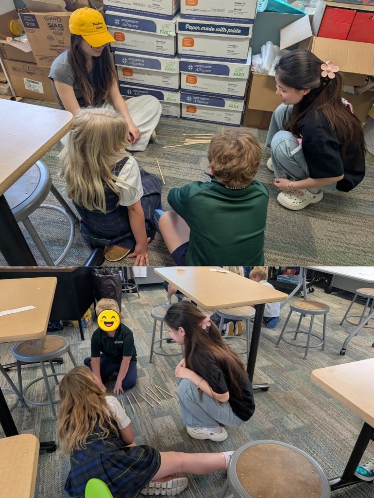 Kids and adults squatting on the floor, engaged in an activity.